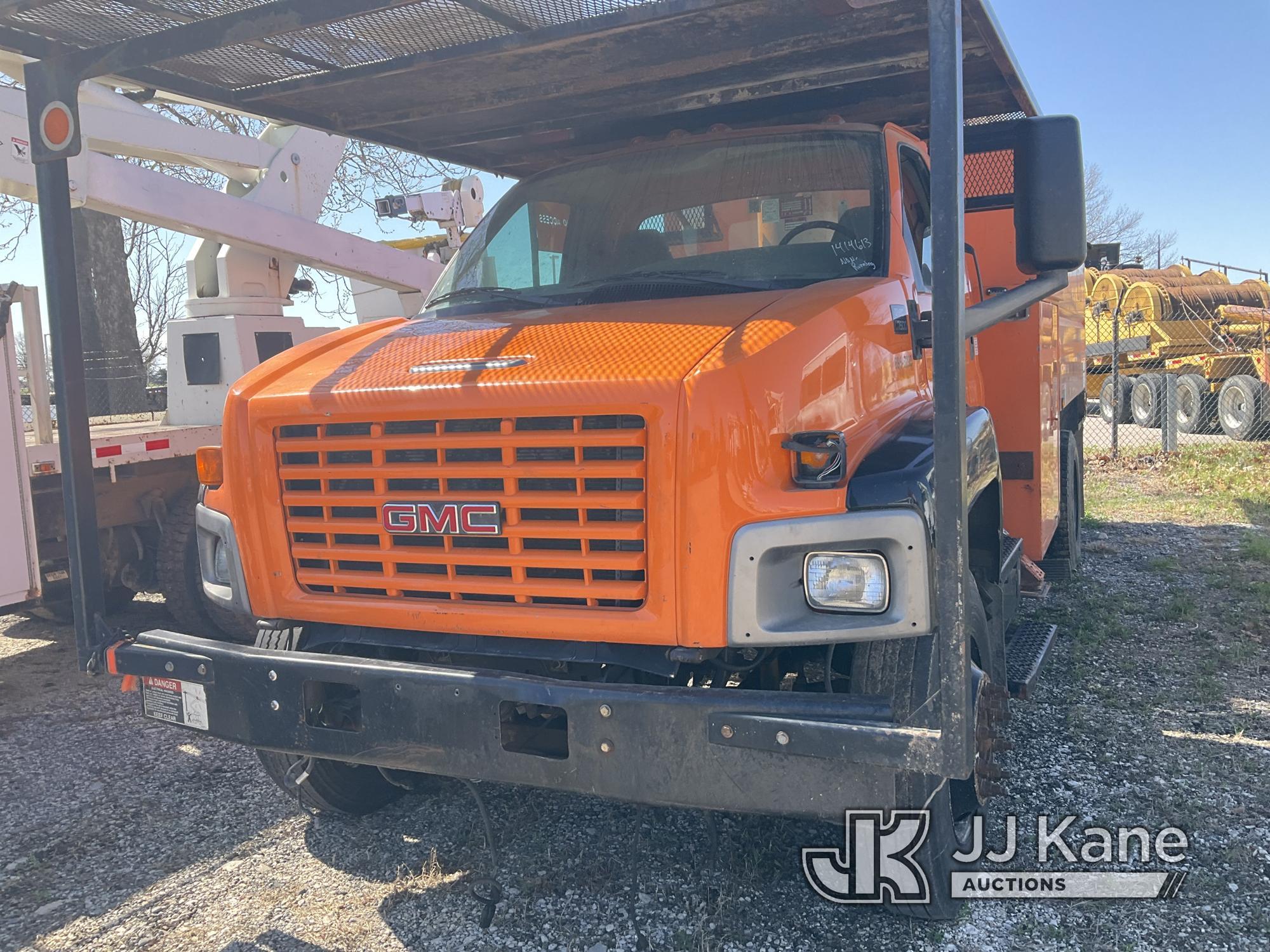 (Kansas City, MO) Altec LRV55, Over-Center Bucket Truck mounted behind cab on 2006 GMC C7500 Chipper