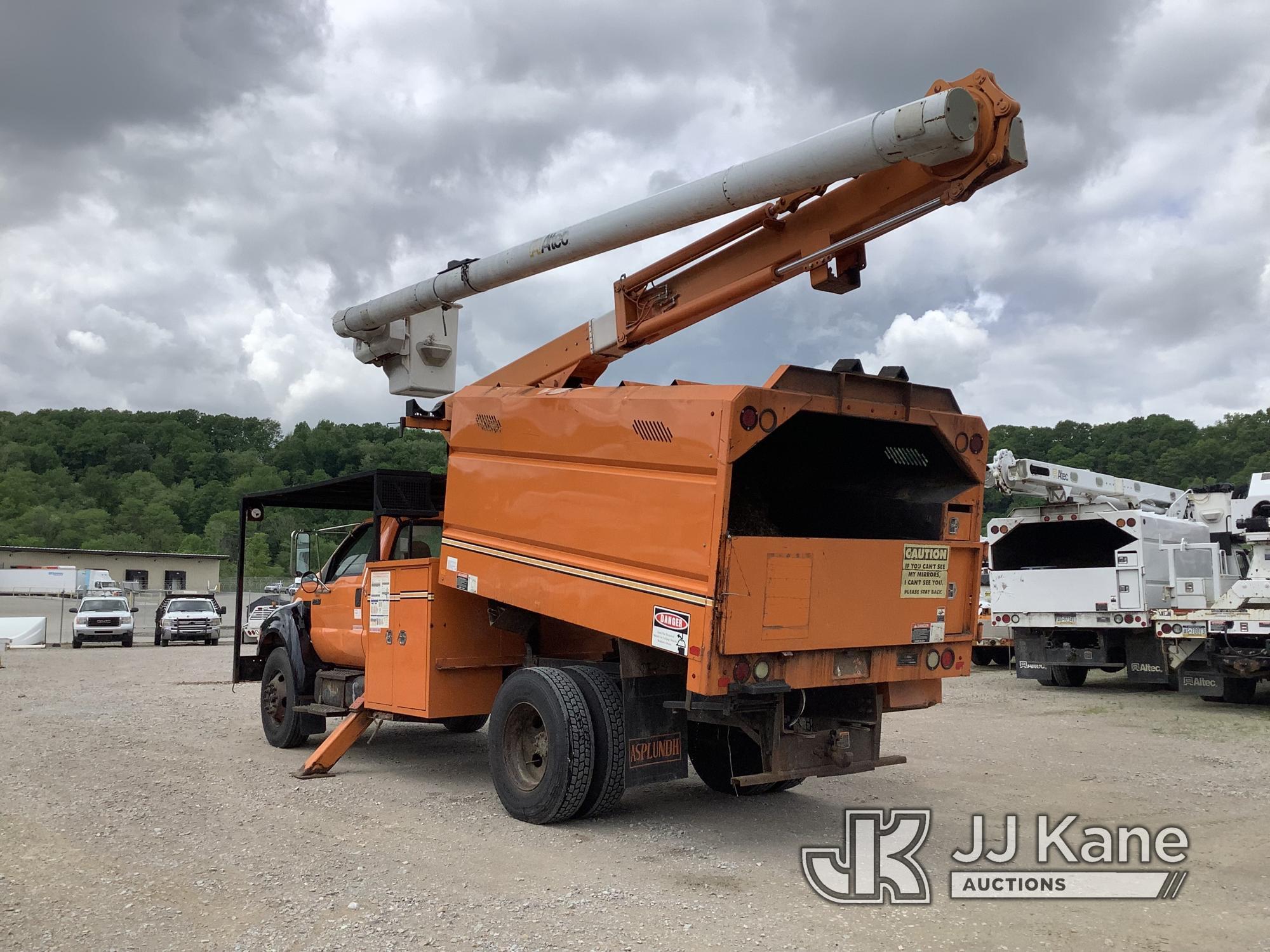 (Smock, PA) Altec LRV55, Over-Center Bucket Truck mounted behind cab on 2010 Ford F750 Chipper Dump