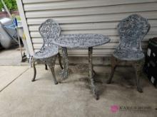 wrought iron patio table and 2 chairs