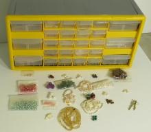 plastic cabinet with assorted new beads  20" x 10" x 7"  deep  Note: beads shown are samples of what