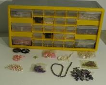 plastic cabinet with assorted beads 20" x 10" x 7" deep   Note: beads shown are samples of what are