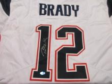 Tom Brady of the New England Patriots signed autographed football jersey TAA COA 715