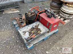 Pallet with water pump and tools