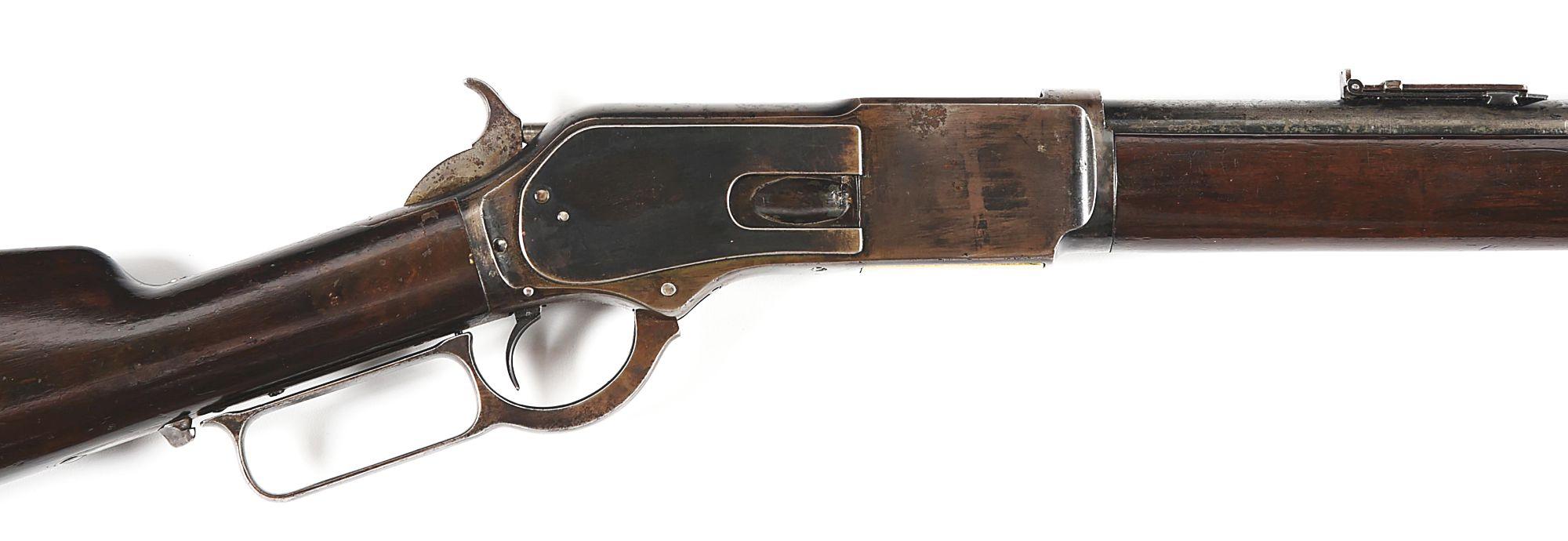 (A) WINCHESTER MODEL 1876 OPEN TOP LEVER ACTION RIFLE.