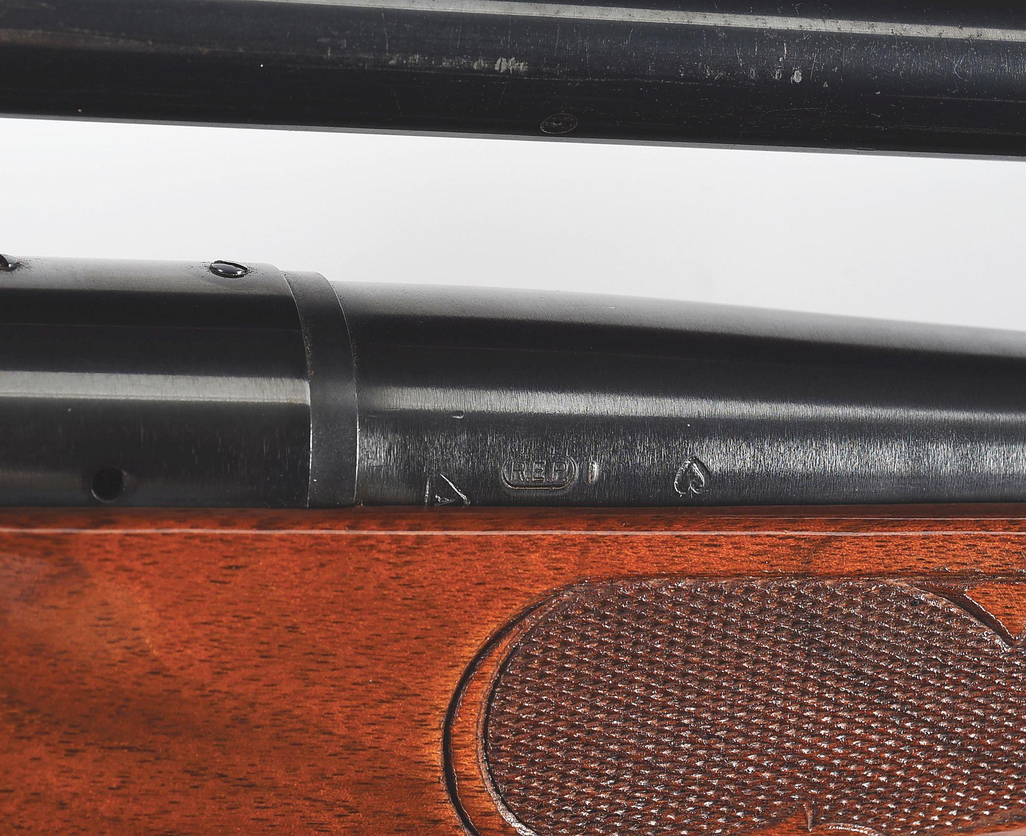 (C) REMINGTON MODEL 700 VARMINT SPECIAL BOLT ACTION RIFLE IN .222 WITH LYMAN OPTIC.