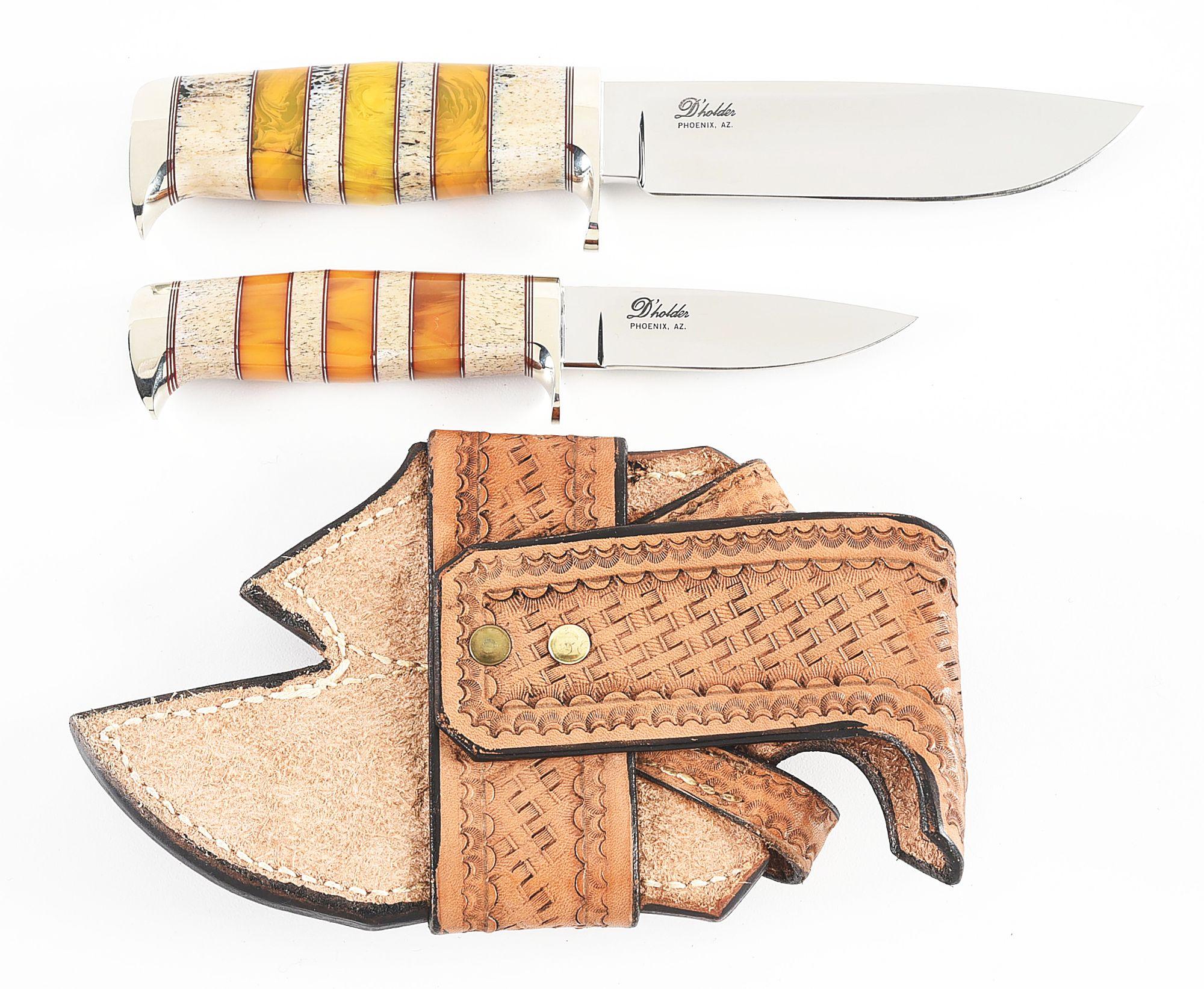 D'HOLDER CUSTOM KNIVES 2 KNIFE SET WITH TOOLED LEATHER DOUBLE SCABBARD.