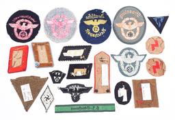 LOT OF THIRD REICH POLICE AND POLITICAL INSIGNIA.