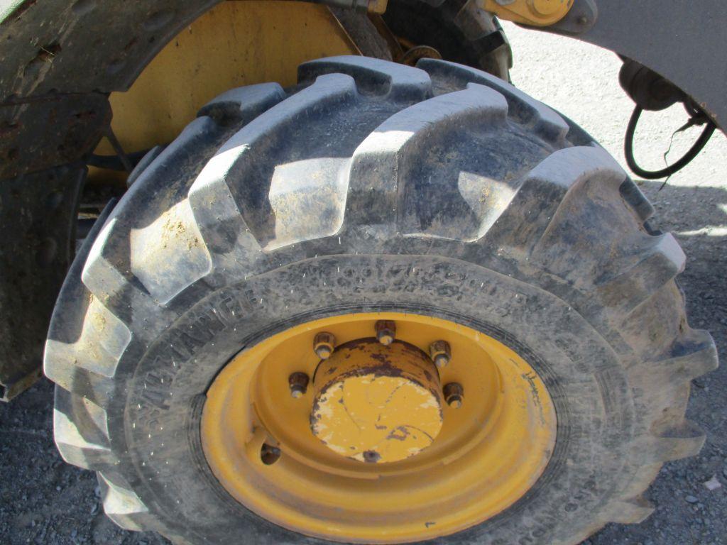2012 John Deere 244J, 7,450 Hrs. 4x4, cab, AC, heat, JRB coupler, Aux Hyd bucket, good tires