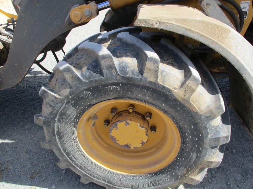 2012 John Deere 244J, 7,450 Hrs. 4x4, cab, AC, heat, JRB coupler, Aux Hyd bucket, good tires