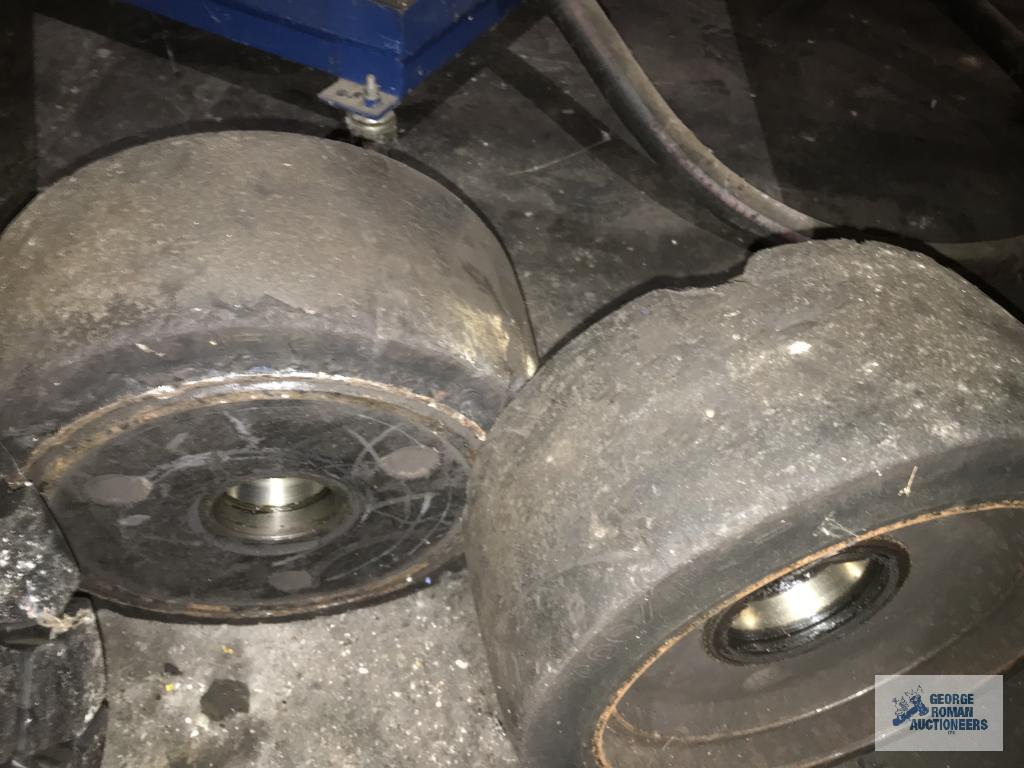 (2) NEW AND (2) USED FORKLIFT WHEELS