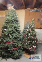 Four lighted Christmas trees