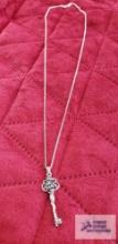Silver colored key pendant marked 925 PZ on silver colored chain marked 925 Italy 7.1 G (Description