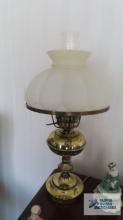 Oil lamp style brass lamp with glass shade