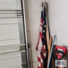 Lot of yard and garden tools with flags