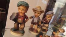 The Newsboy, The Fishing Boy, and Boys Best Friend figurines