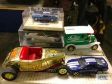 1970 BOSS MUSTANG AND SHELBY COBRA MODEL CAR IN DISPLAY CASE. FULLER BANK CAR AND OTHER MODEL CARS.