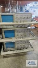 Three Energy Concepts Inc oscilloscopes, model 30920E, two have cords