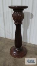 Carved wood pedestal. 35 in. tall by 11-1/2 in. round