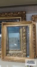 Antique gold frame with glass. Inside measurement is 16 in. by 20 in. Outside measurement is 21 in.