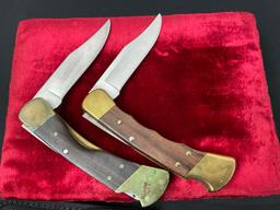 Pair of Vintage Buck 110 Folding Pocket Hunting Knives, Brass and Wooden handles