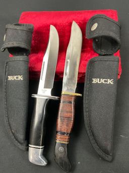 Pair of Vintage Buck Fixed Blade Knives, model 119, different handles, Black resin & stacked leat...