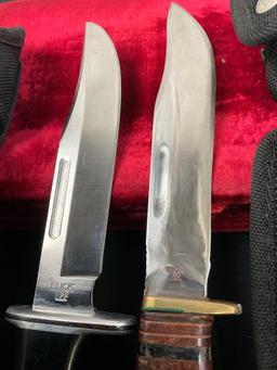Pair of Vintage Buck Fixed Blade Knives, model 119, different handles, Black resin & stacked leat...