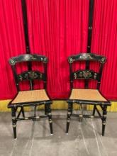 Pair of Antique Black & Gold Painted Kitchen Chairs w/ Floral Accents & Caned Seats. See pics.