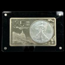 2021 type 2 uncirculated U.S. American Eagle silver dollar in a 35th anniversary white metal ingot
