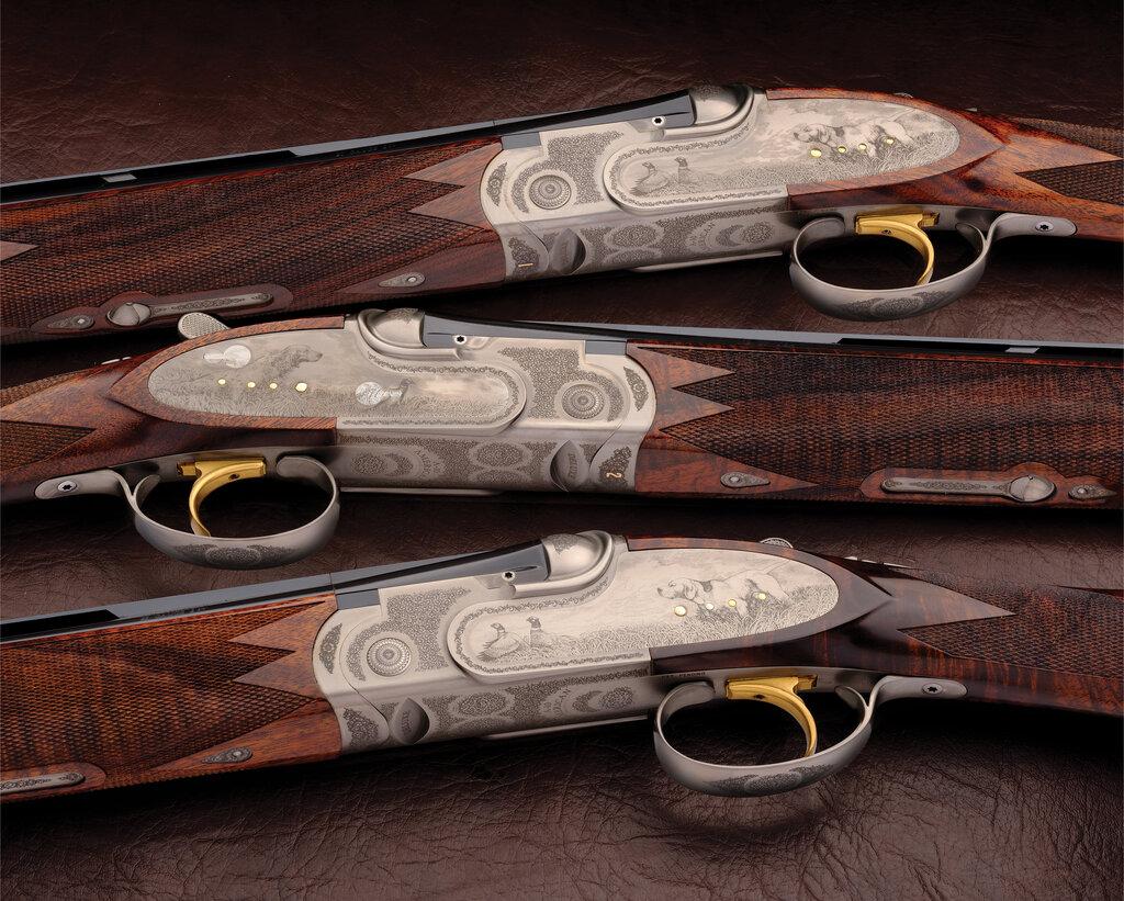 Pair of Engraved C.S.M.C. A-10 American Deluxe Shotguns