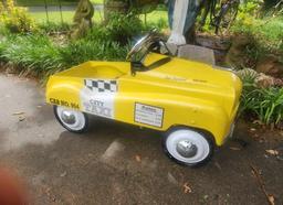 Heavy metal City Taxi yellow pedal car