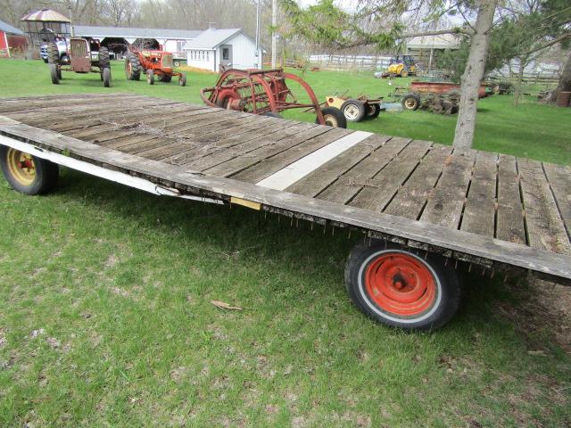 146. 4 WHEEL WAGON WITH OLDER 8 FT. X 16 FT. WOODEN FLAT RACK