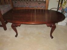 Elegant Queen Anne Style Cherry Oval Cocktail Table On Padded (17"H x 46" x 27 1/2")