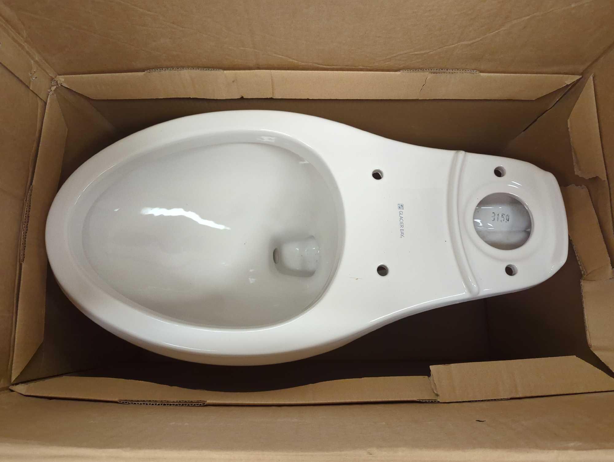 Glacier Bay 2-piece 1.1 GPF/1.6 GPF High Efficiency Dual Flush Complete Elongated Toilet in White,