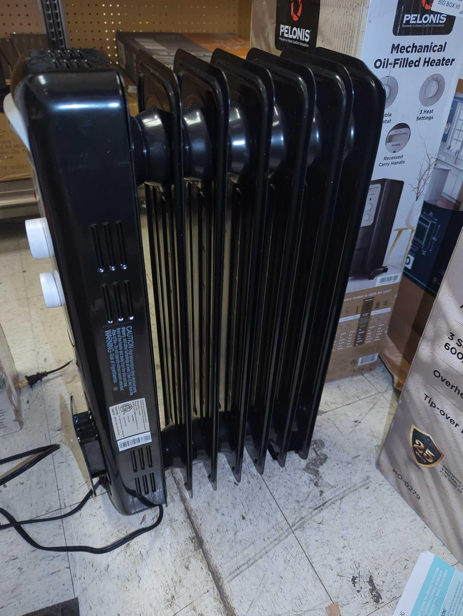 Pelonis 1,500-Watt Oil-Filled Radiant Electric Space Heater with Thermostat, Retail Price $55,