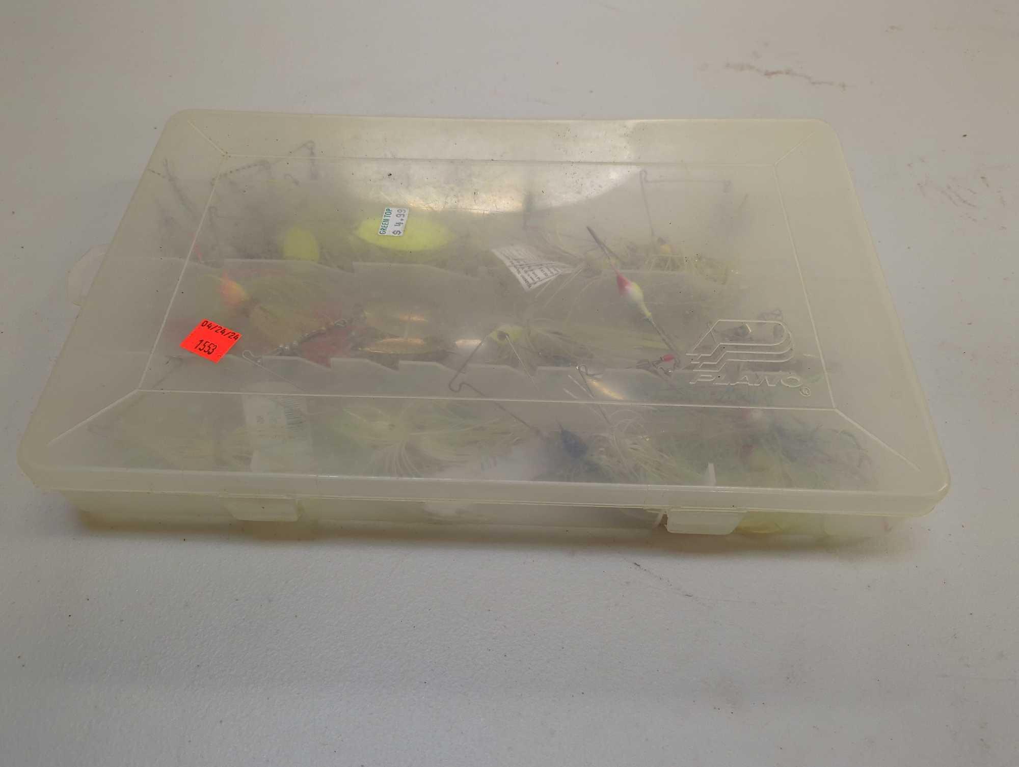 Tackle Box and contents including various fishing lures of similar style. Comes as is shown in