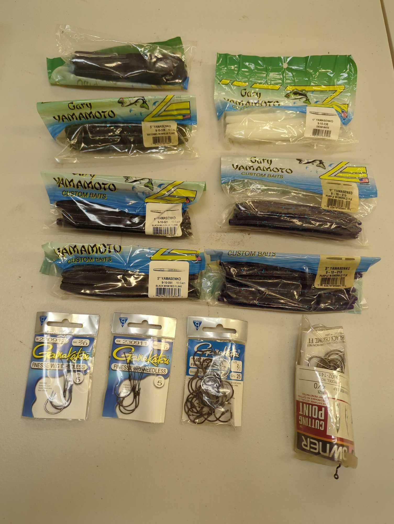 Tackle Box and contents including various worms and other various fishing lures. Comes as is shown