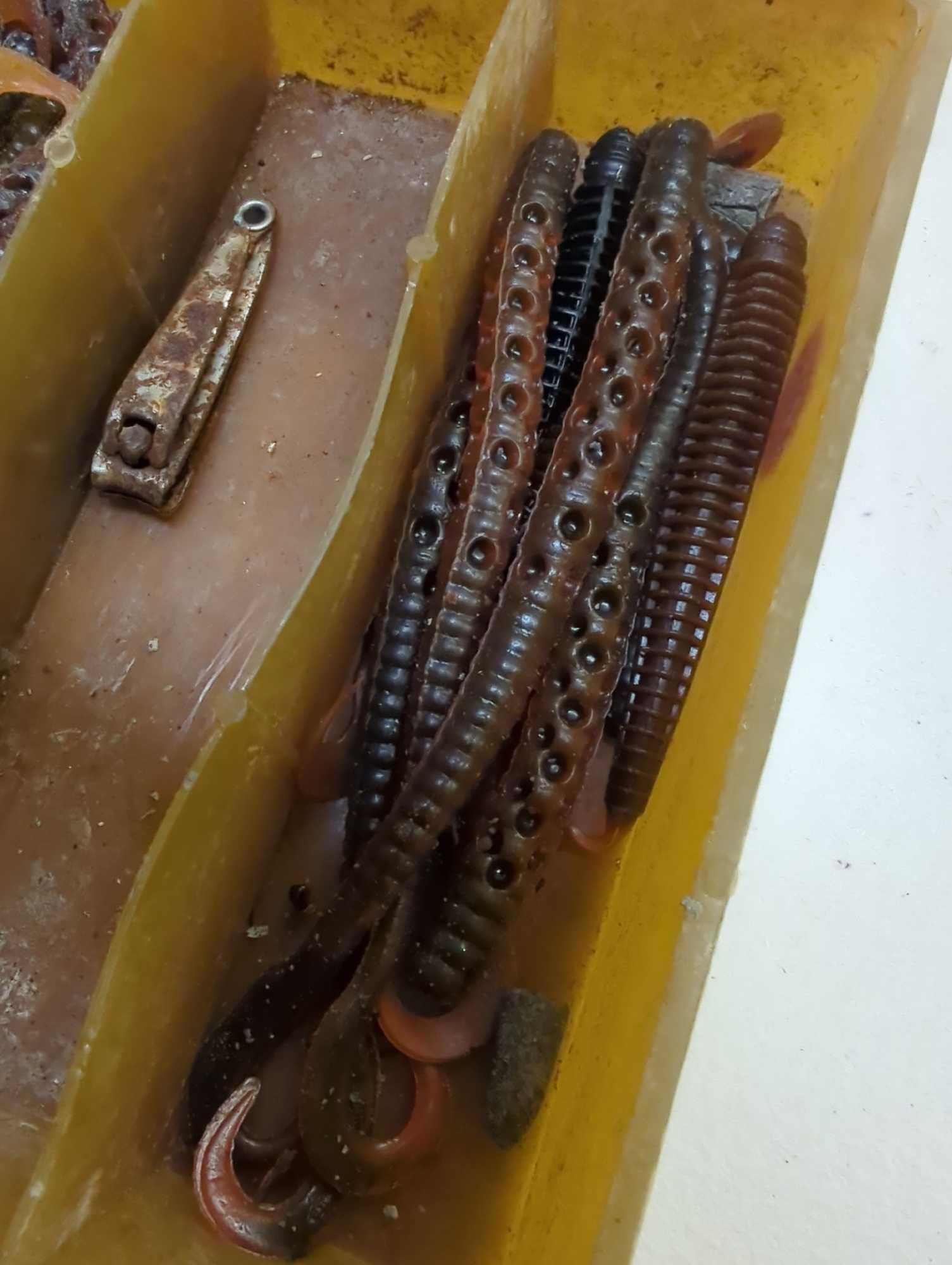 Brown Tackle Box and contents including worm fishing lures. Comes as is shown in photos. Appears to