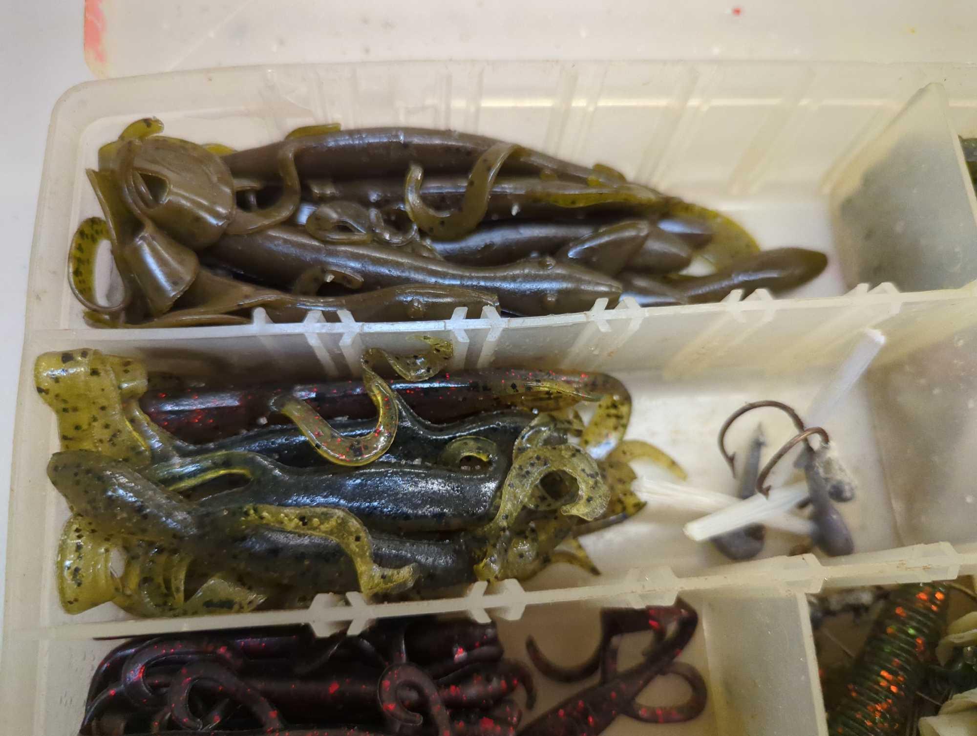 Tackle Box and contents including various worm fishing lures. Comes as is shown in photos. Appears