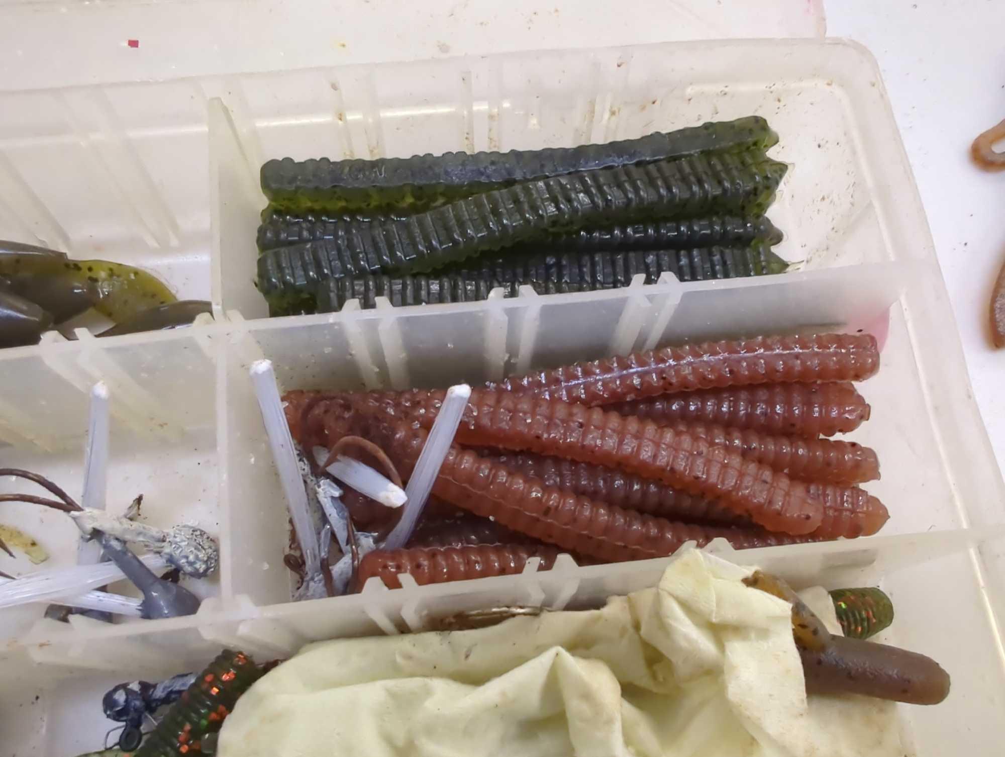 Tackle Box and contents including various worm fishing lures. Comes as is shown in photos. Appears
