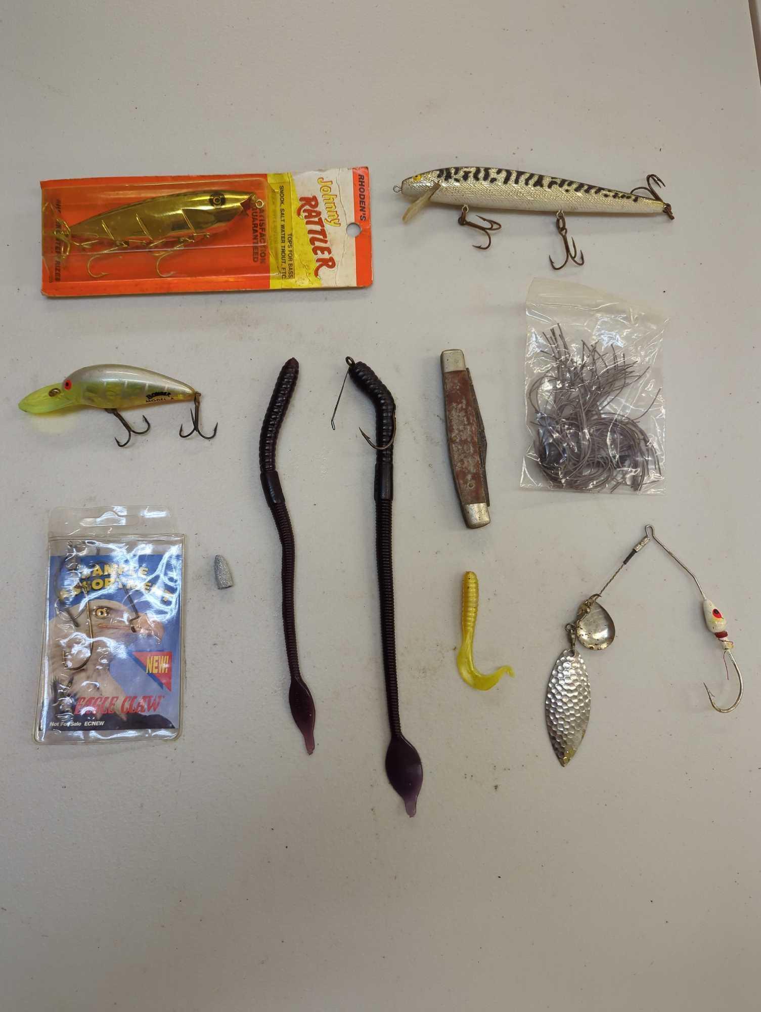 Dual-sided Tackle Box and contents including fishing accessories, various worms, and many other