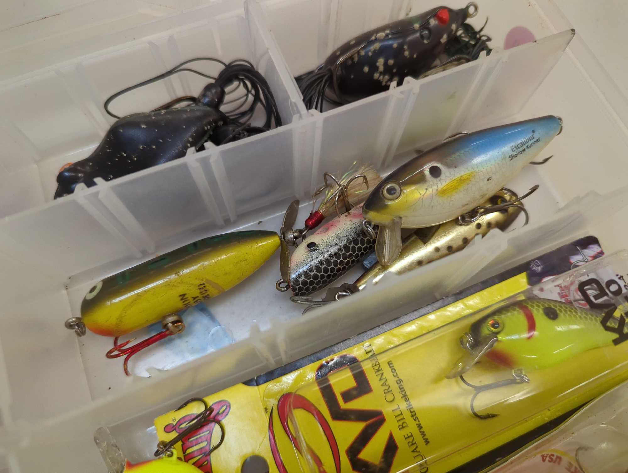 Tackle box and contents including various fishing. Lures. Comes as is shown in photos. Appears to be