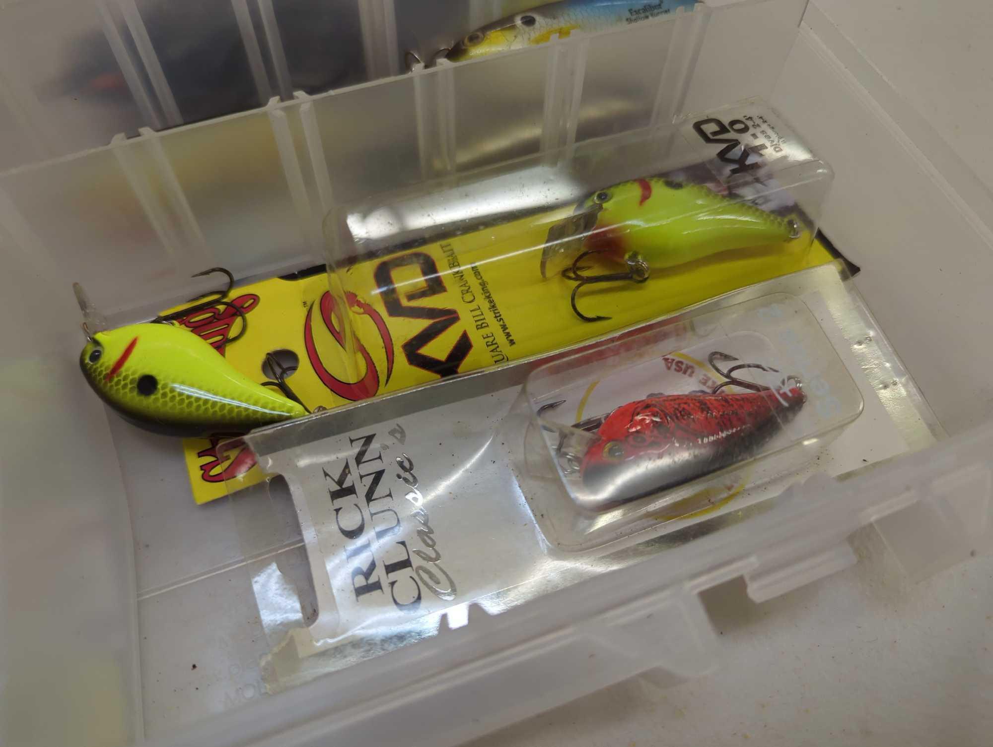 Tackle box and contents including various fishing. Lures. Comes as is shown in photos. Appears to be