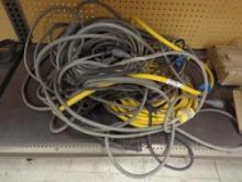 Lot of four Locking Style Generator Extension Cords varying in colors of yellow and gray. Comes as