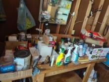 (GAR) LOT OF MISCELLANEOUS ITEMS ON TOP OF WORKBENCH TO INCLUDE, CHEMICALS, TOOL BOX, TOOLS, ETC,
