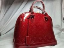LV Red Super Clone Bag. Appears to be new. Also comes with lock.