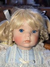 (GAR) Kelly Robert "Clara" Porcelain Doll with Blonde Hair and Blue Eyes Wearing a Light Blue Dress