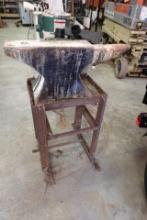 ANVIL ON STAND 2.1.0 MEASURES 27 1/2 INCH LONG X 5 INCH WIDE X 1 FOOT TALL