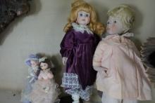PAIR OF BRADLEY DOLLS AND NANCY LESLIE DOLL AND OTHER DOLL