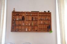 PRINTERS BOX WALL HUNG WITH COLLECTION OF MINIATURE BOTTLES DOLLS FIGURINES