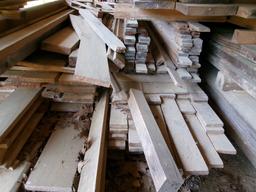 PILE OF ROUGH CUT LUMBER